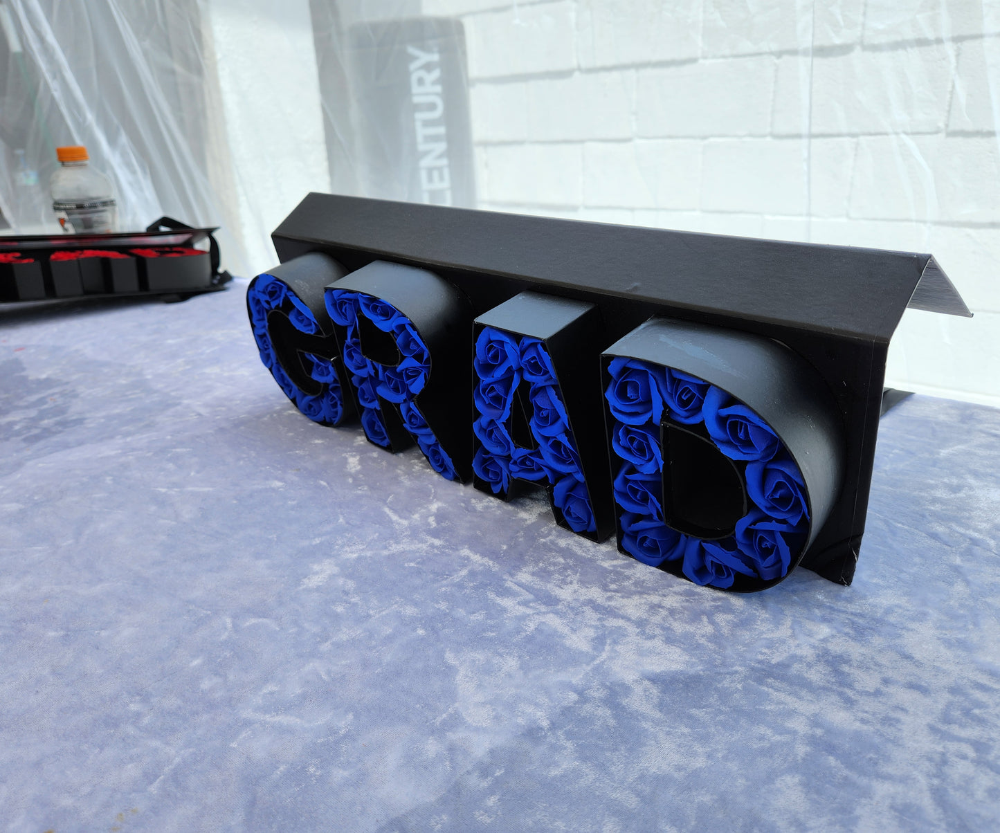 Black "GRAD" box with 36 Blue Rose Soaps